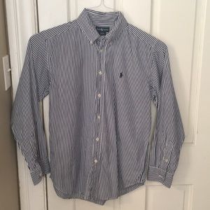 Crisp navy Polo with white pin stripes.